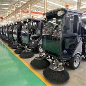 The compact sweeper sits at the center of this plan because it stays busy all year