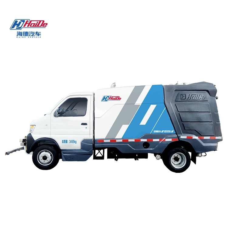 Dustbin cleaning truck washing along a roadside route with controlled water spray
